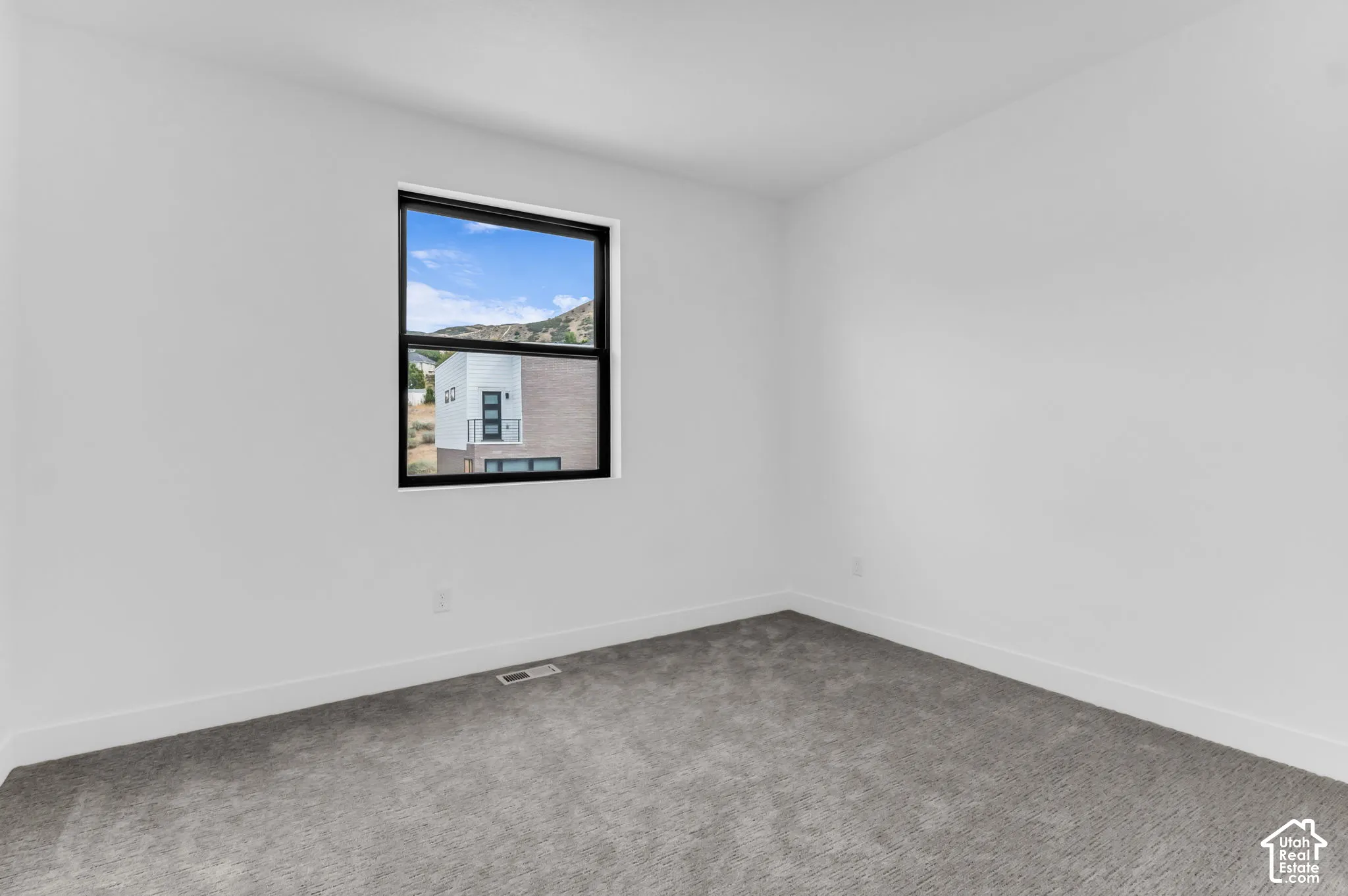 2nd bedroom w/ ensuite bathroom and mountain views