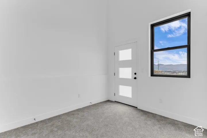 3rd bedroom with patio access and ensuite bathroom
