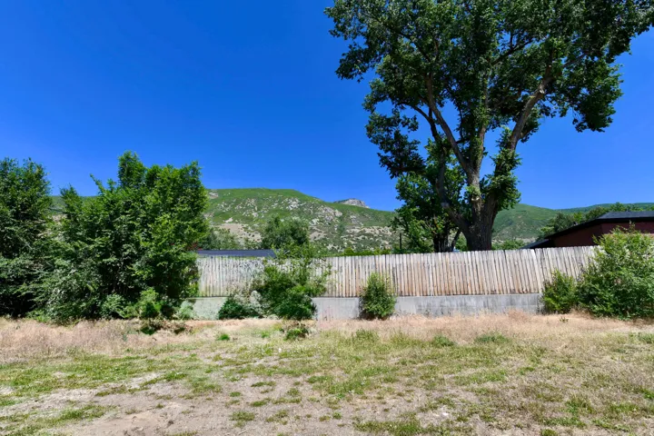 Wood privacy fence with concrete base