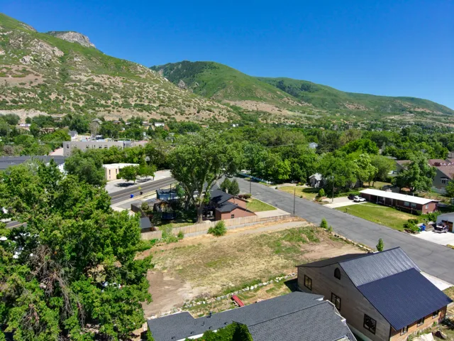 Expansive mountainous backdrop frames the surrounding area