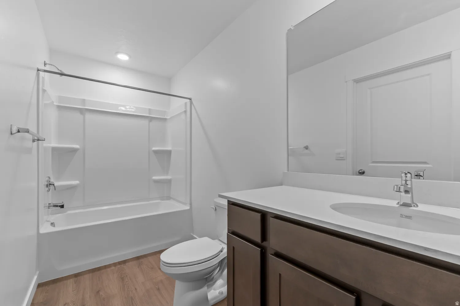 White bathtub and shower combination unit