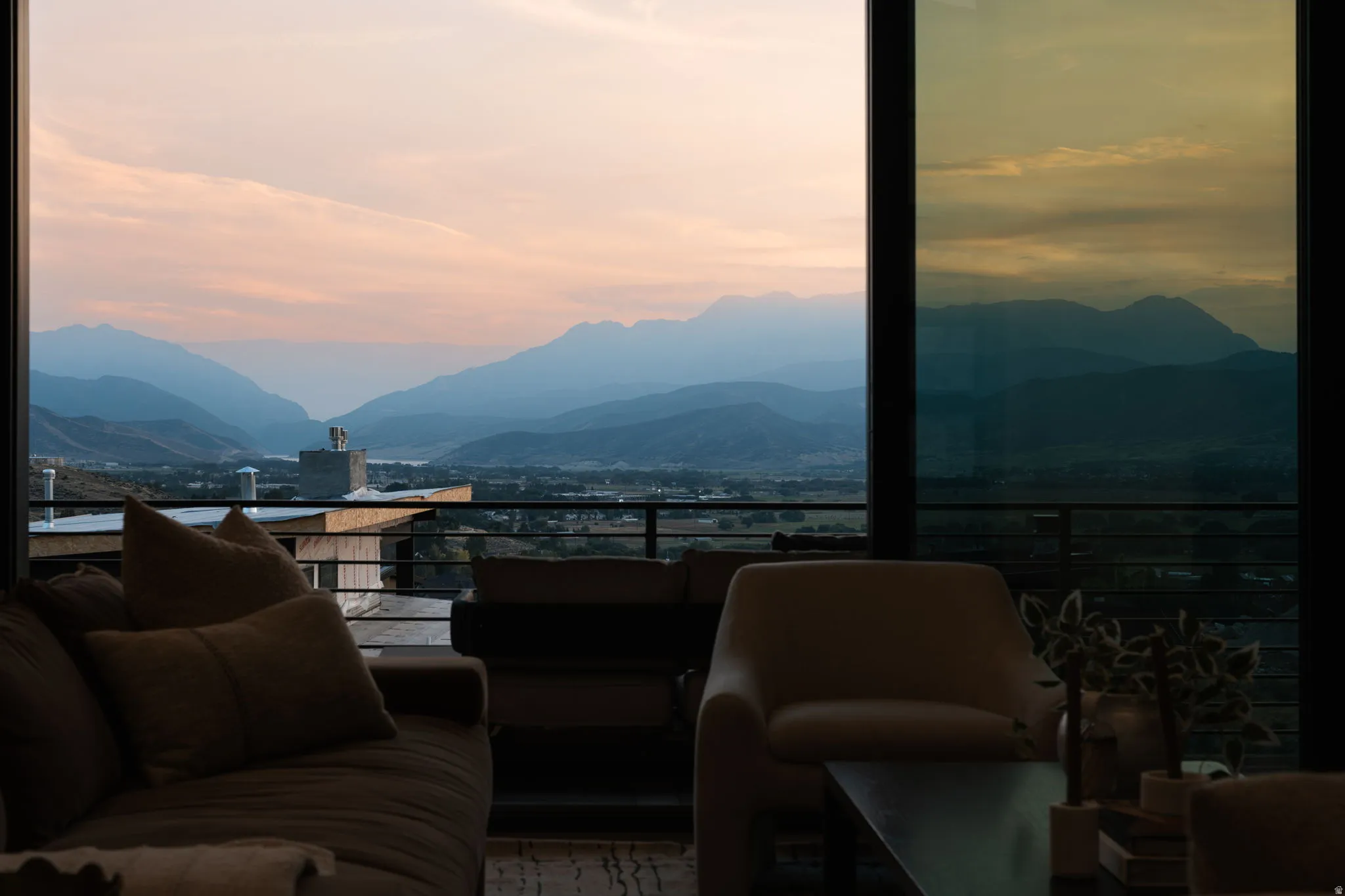 Expansive windows offering mountain scenery