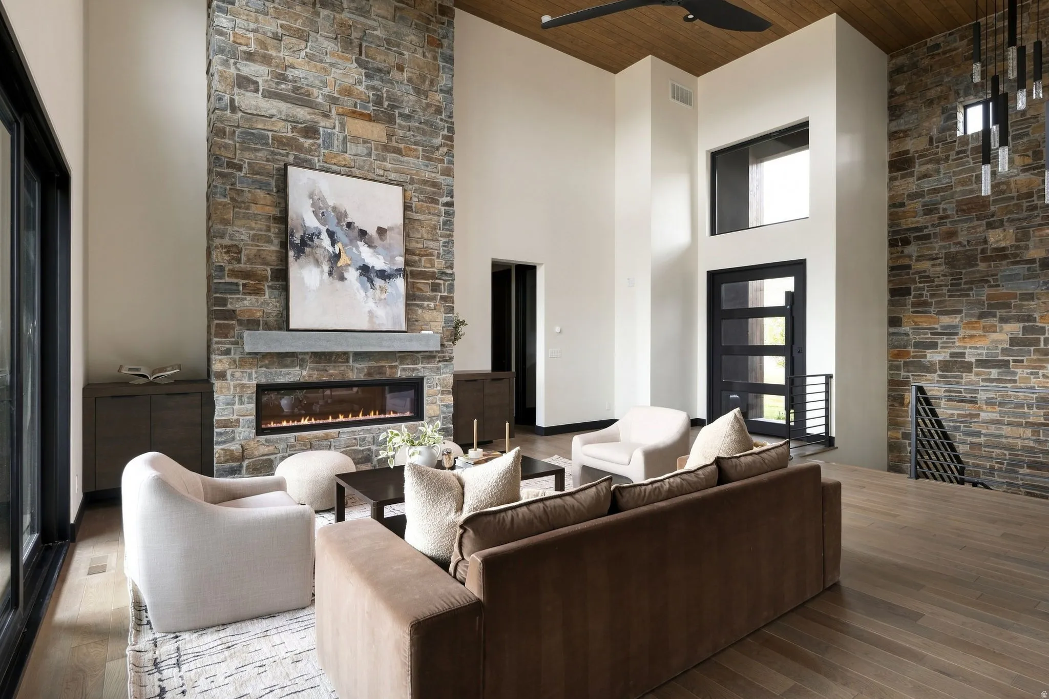 Soaring ceilings with wood-finish accents