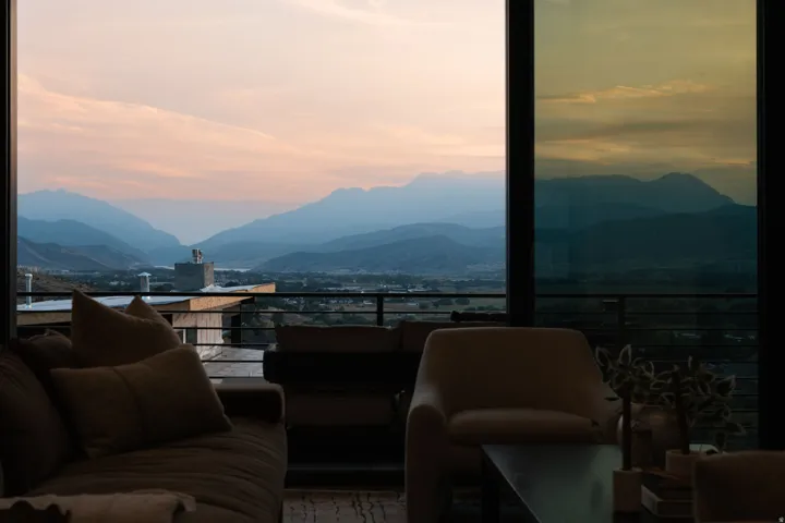 Expansive windows offering mountain scenery