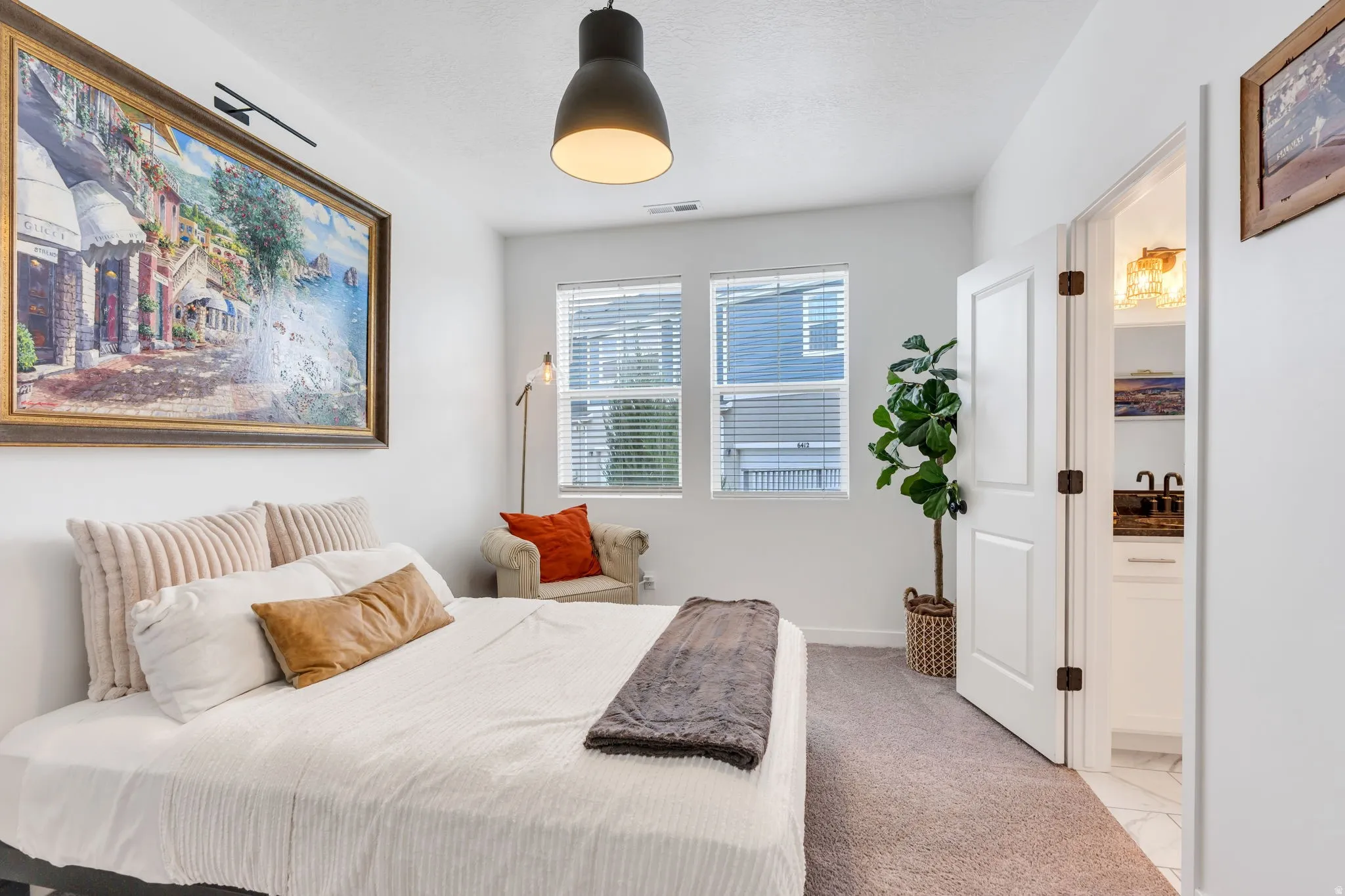 Recessed lighting, dual windows with blinds, and carpeted flooring
