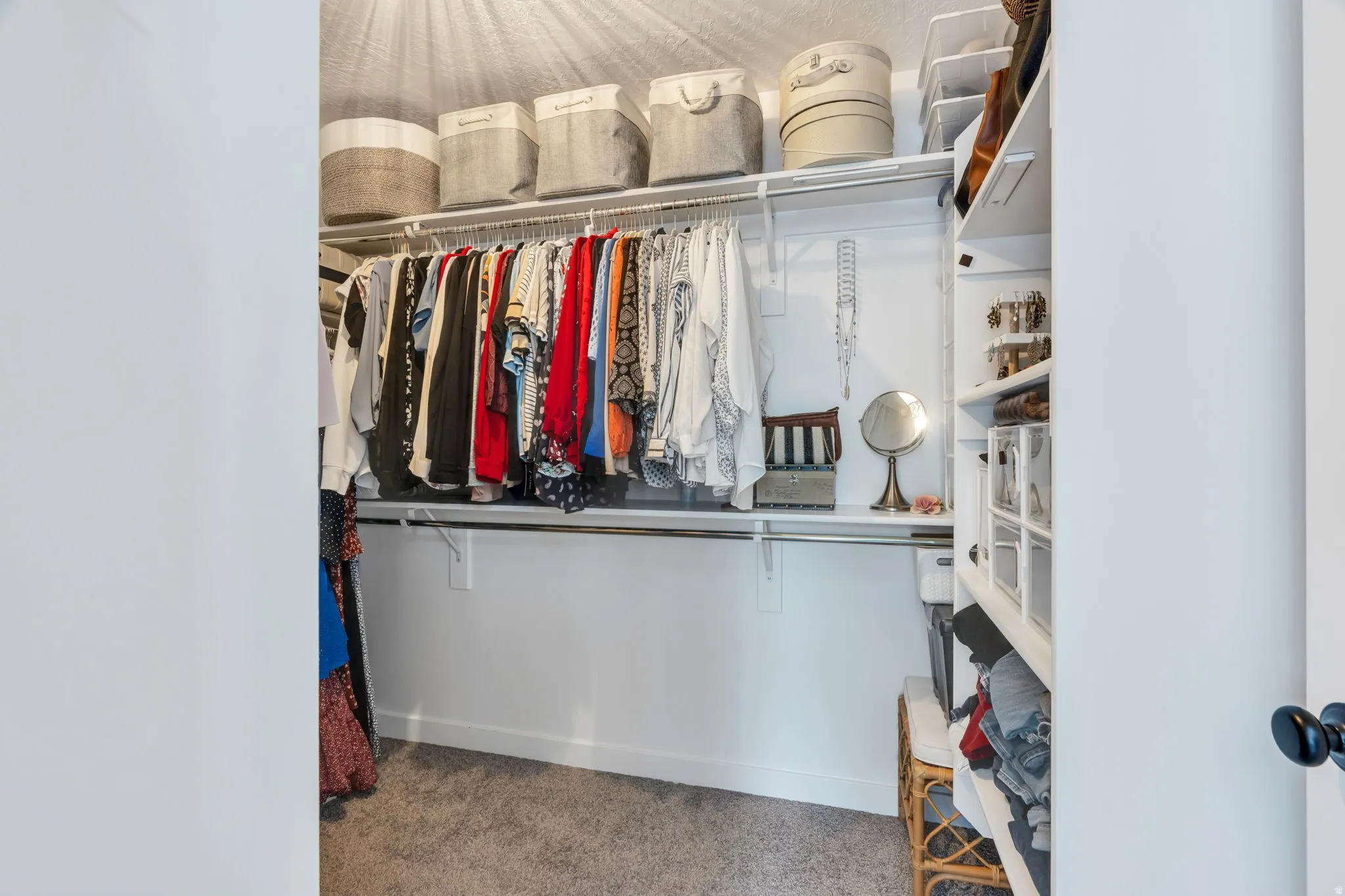 Custom built-in closet system with shelving and hanging rods