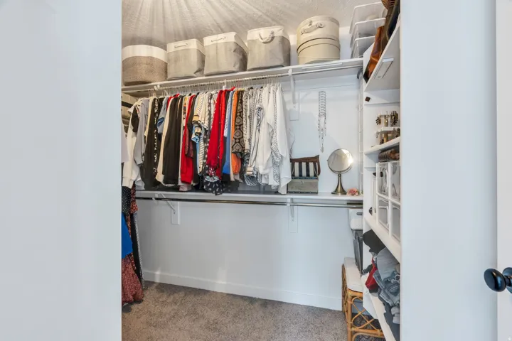 Custom built-in closet system with shelving and hanging rods