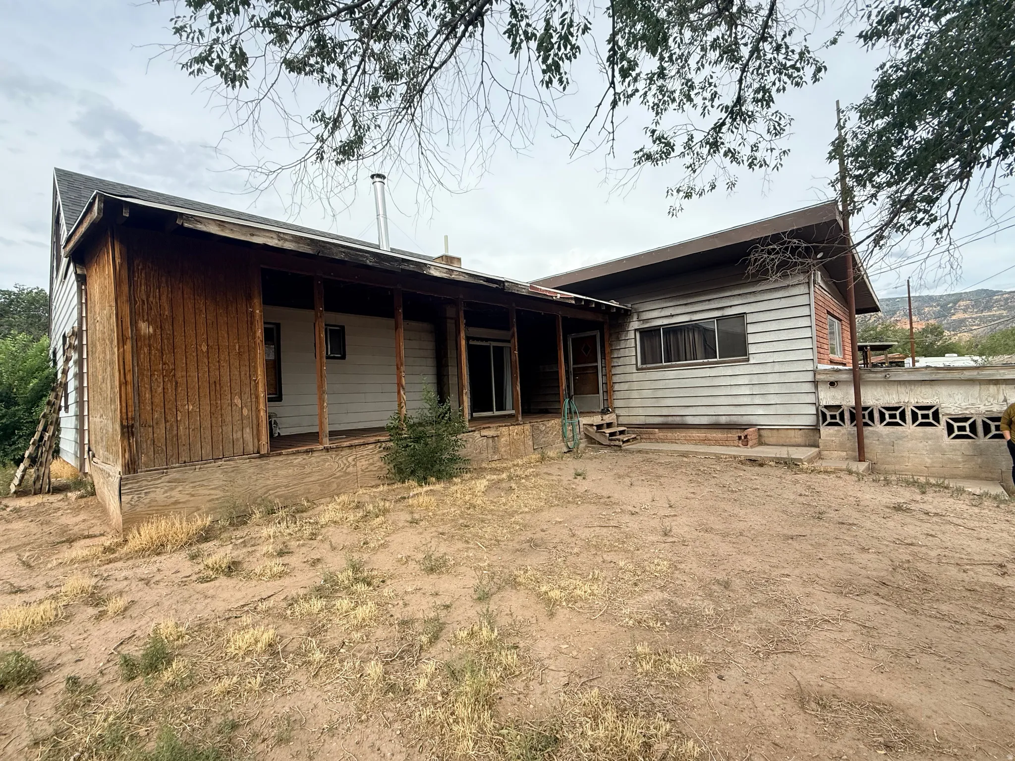 Wood-sided exterior with a covered porch