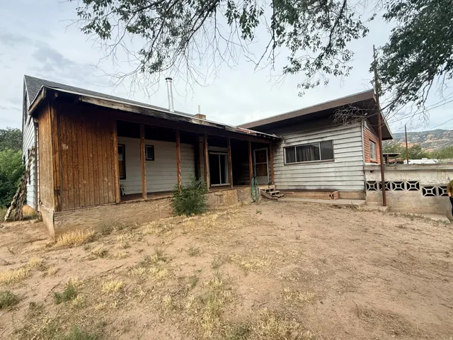 Wood-sided exterior with a covered porch