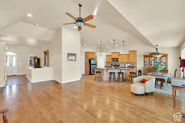 Open-concept living area with hardwood flooring throughout