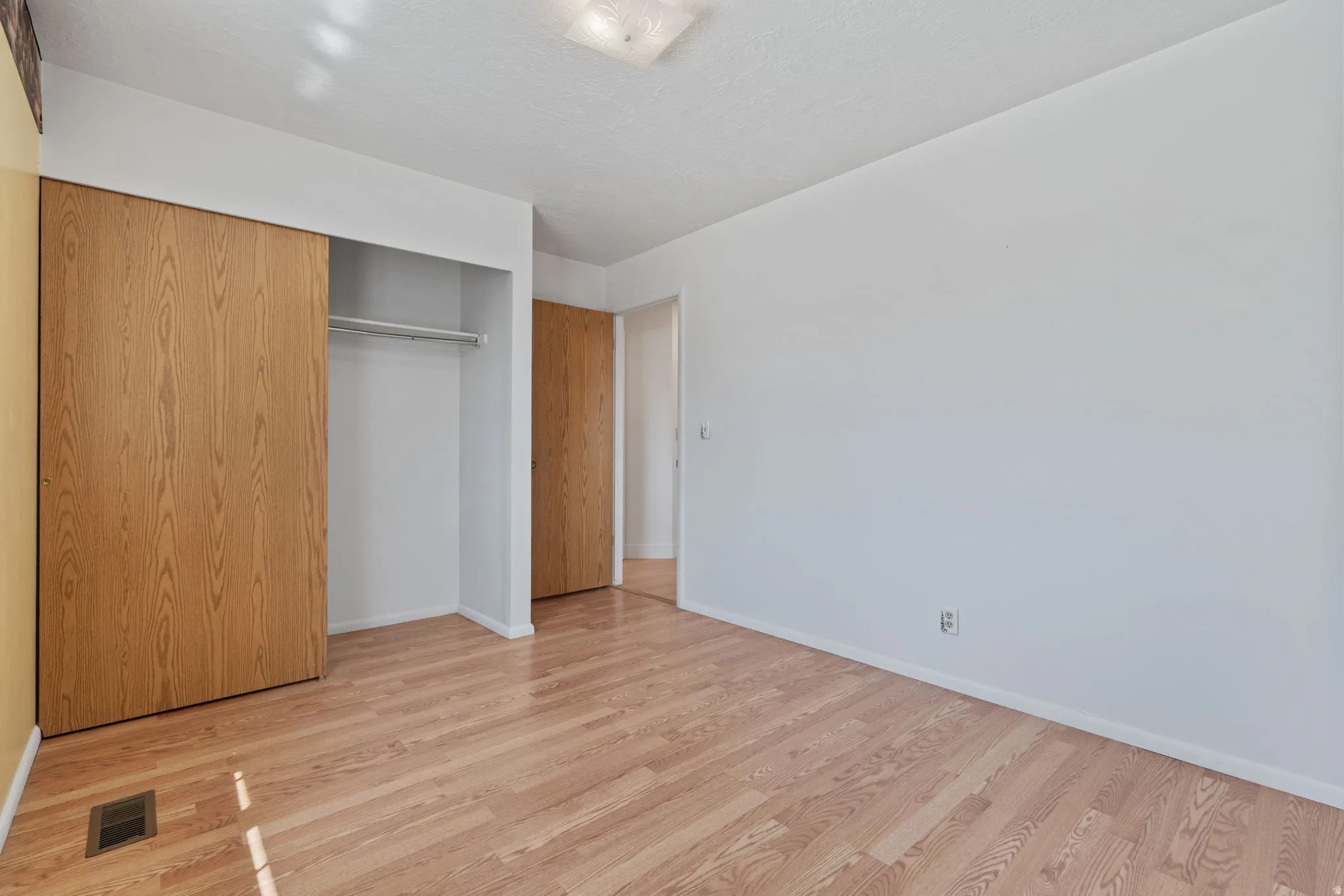 Wood-finish flooring throughout
