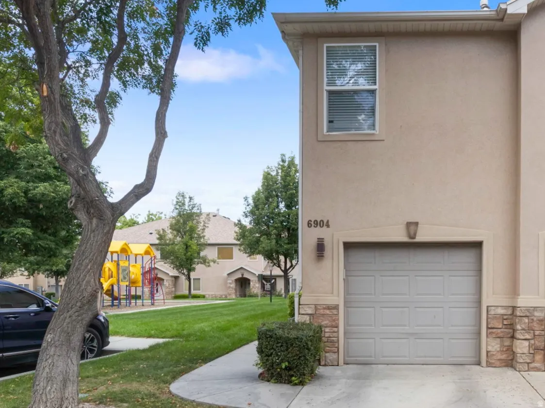 Stucco exterior with stone accents
