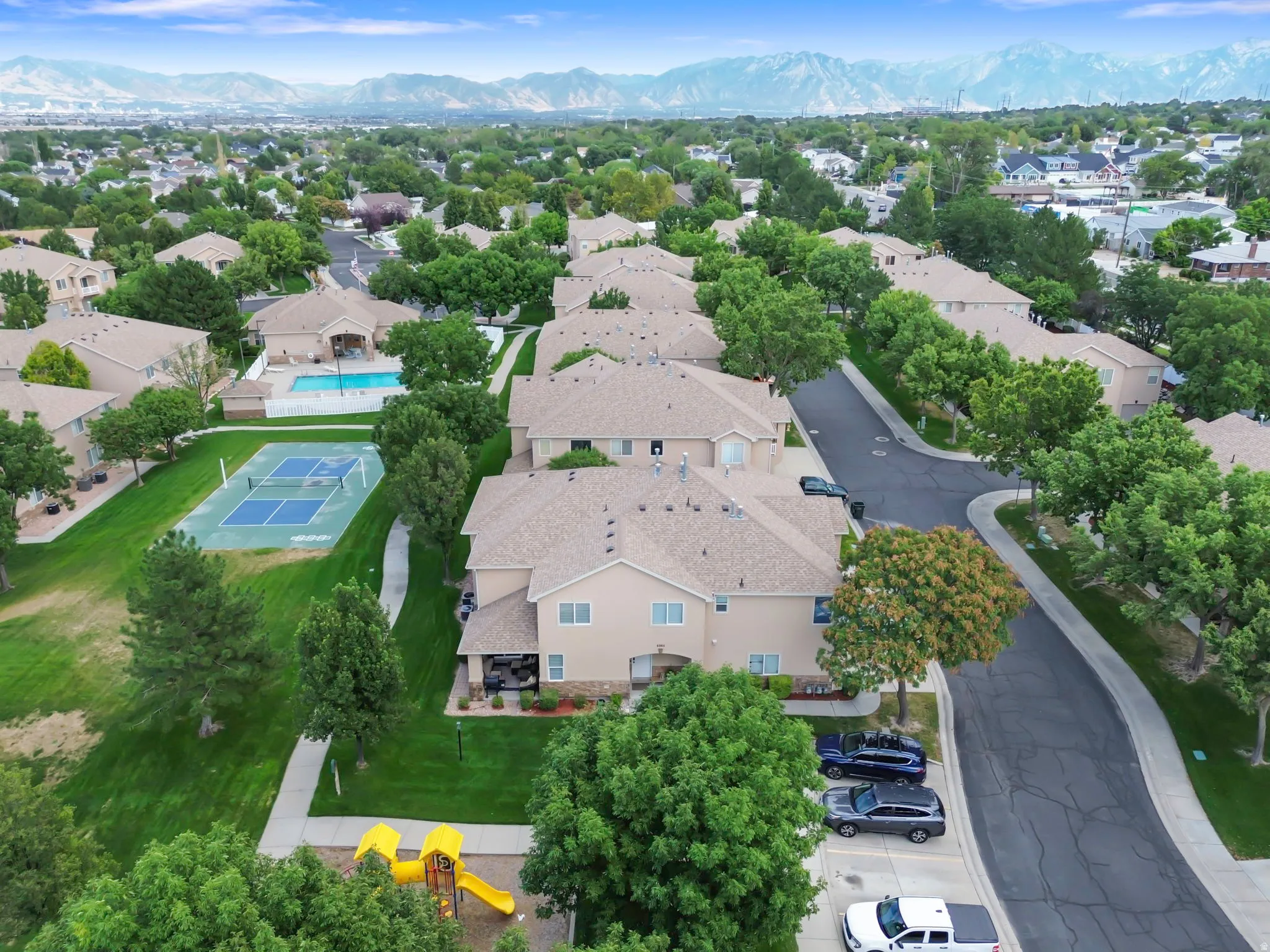 Community amenities include a swimming pool, tennis court, and playground