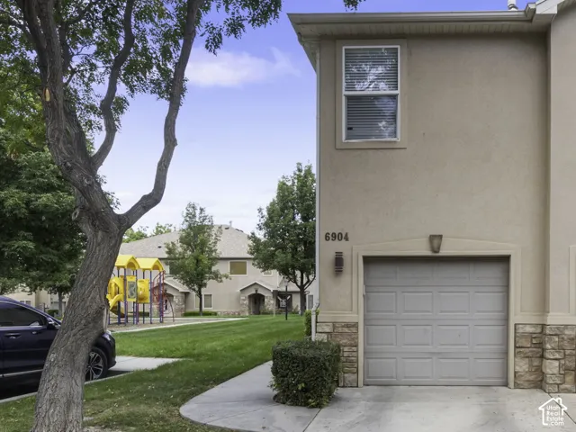 Stucco exterior with stone accents