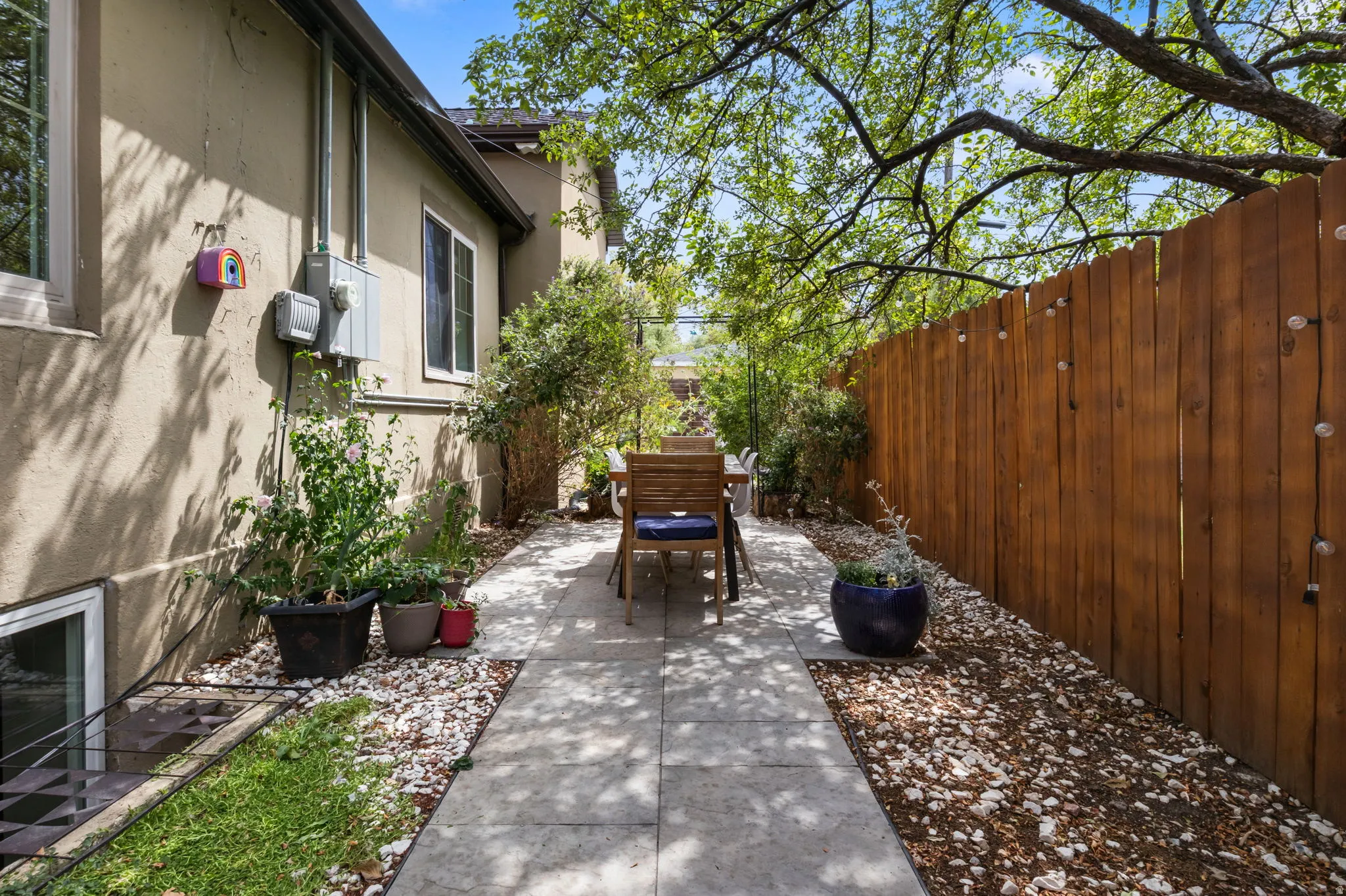 Zen like garden off the living room. Outdoor dining.