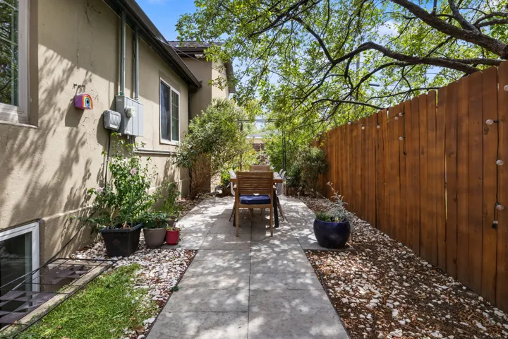 Zen like garden off the living room. Outdoor dining.