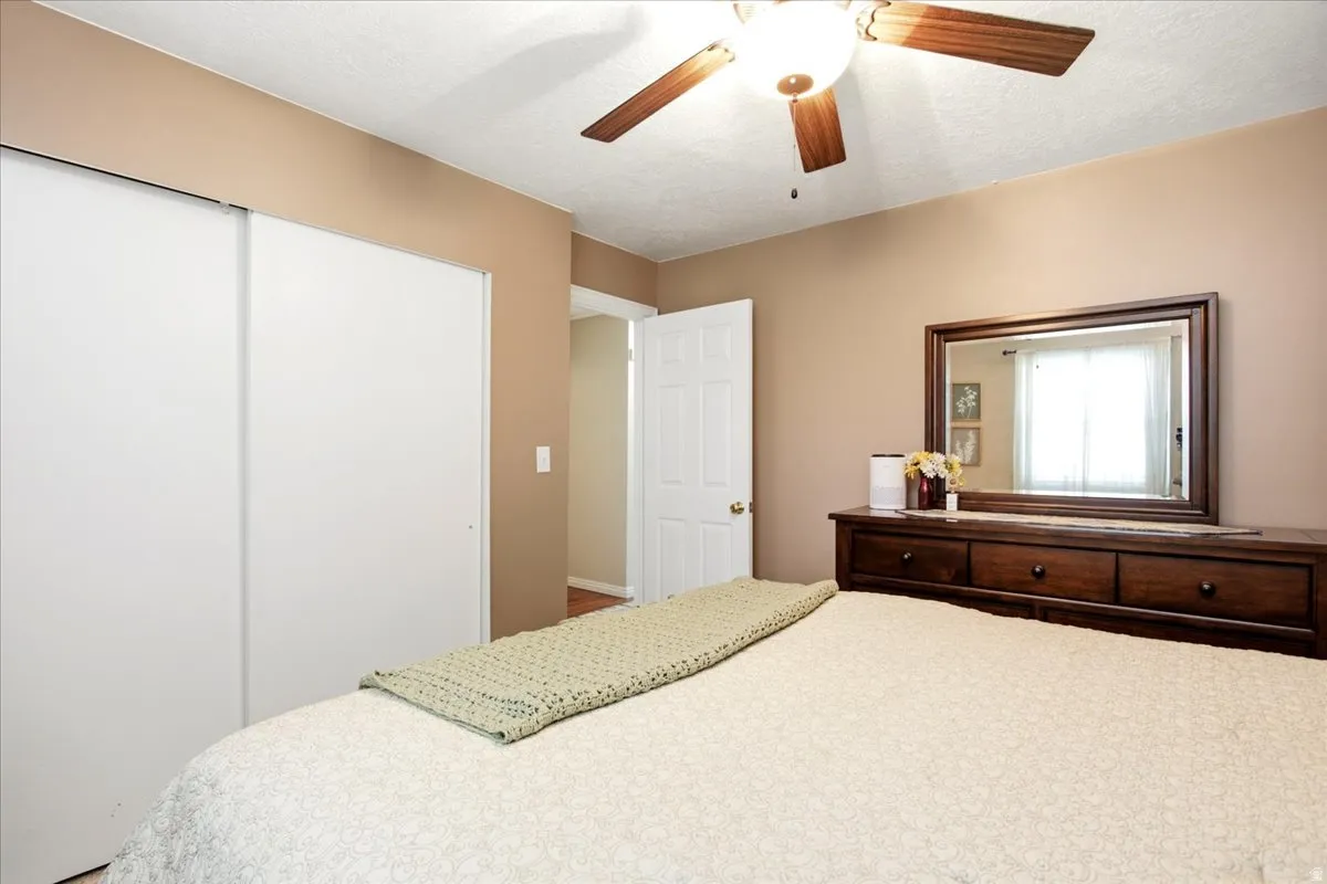 Recessed lighting and ceiling fan with wood-finish blades
