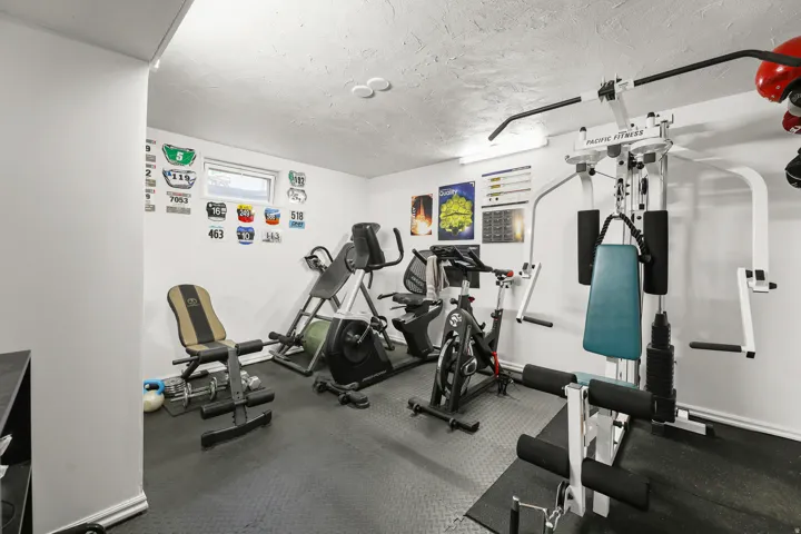 Flexible basement room, could be used for a bedroom or workout room.