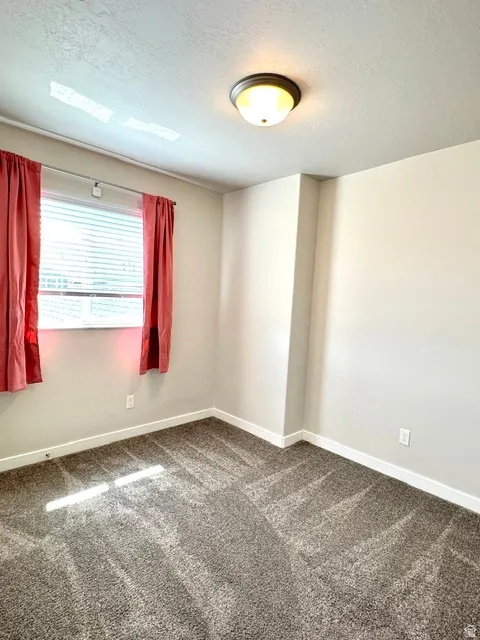 Bedroom #1 at top of stairs with south facing window