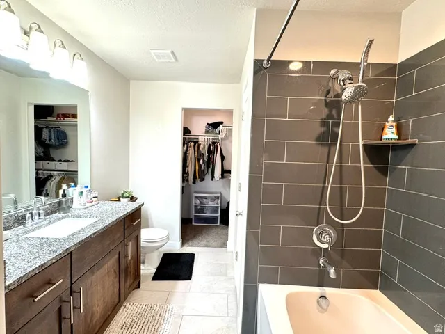 Primary bathroom with attached closet