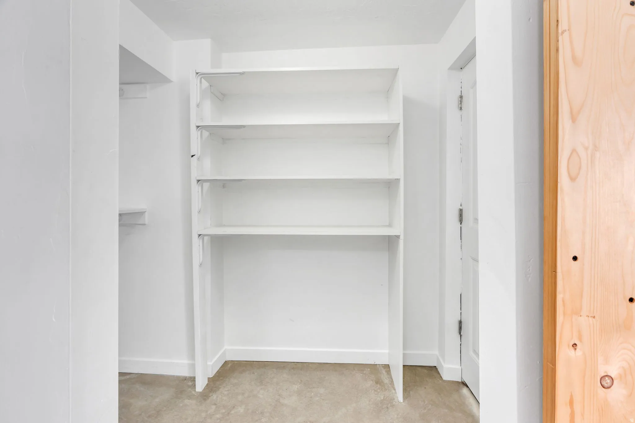 Built-in shelving unit with three open shelves