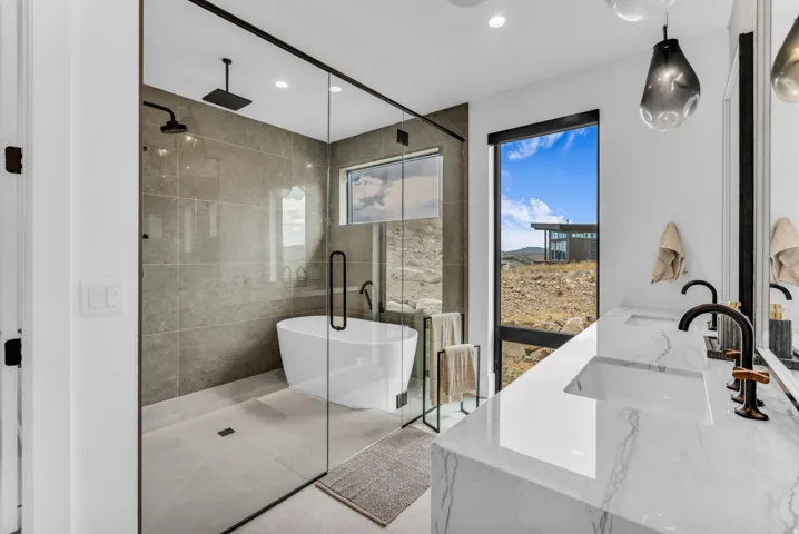 Dual vanity with integrated sinks and white stone-finish countertop