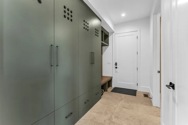 Built-in storage cabinetry with integrated bench seating and shelving