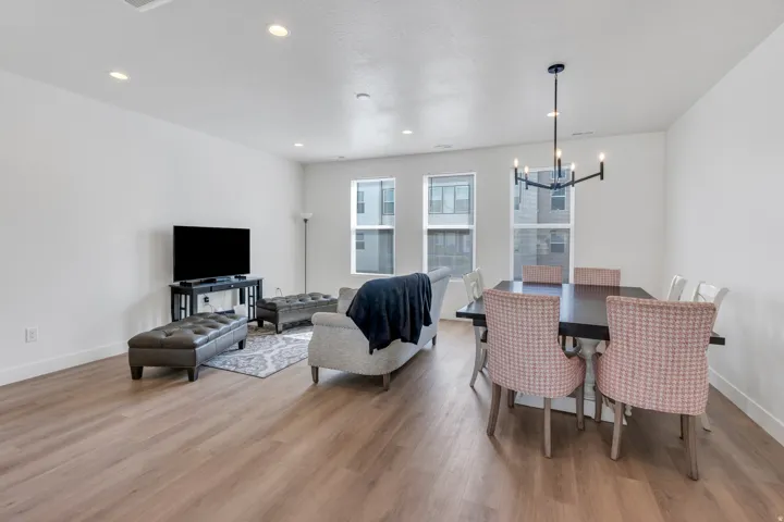 Spacious living and dining area with large windows and modern finishes.