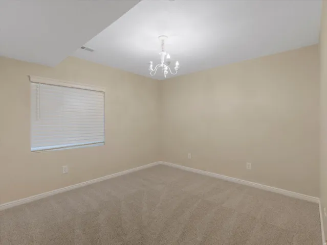 Bedroom 2, neutral tone painted walls