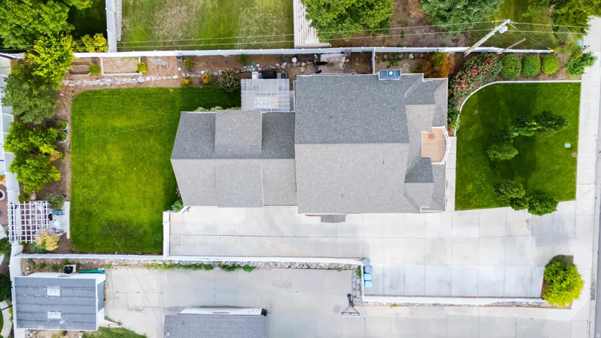 Expansive paved driveway and exterior parking area