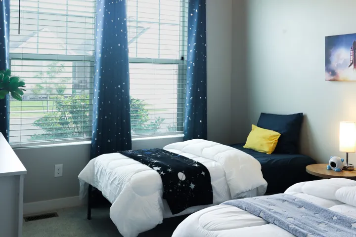 Wall-to-wall carpeting and neutral wall tones