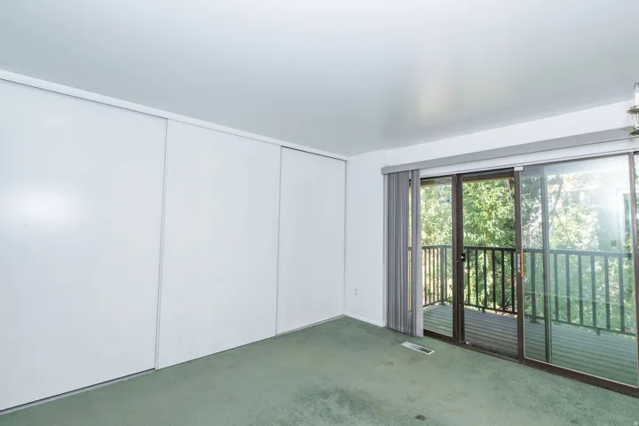 Sliding glass doors opening to a private balcony