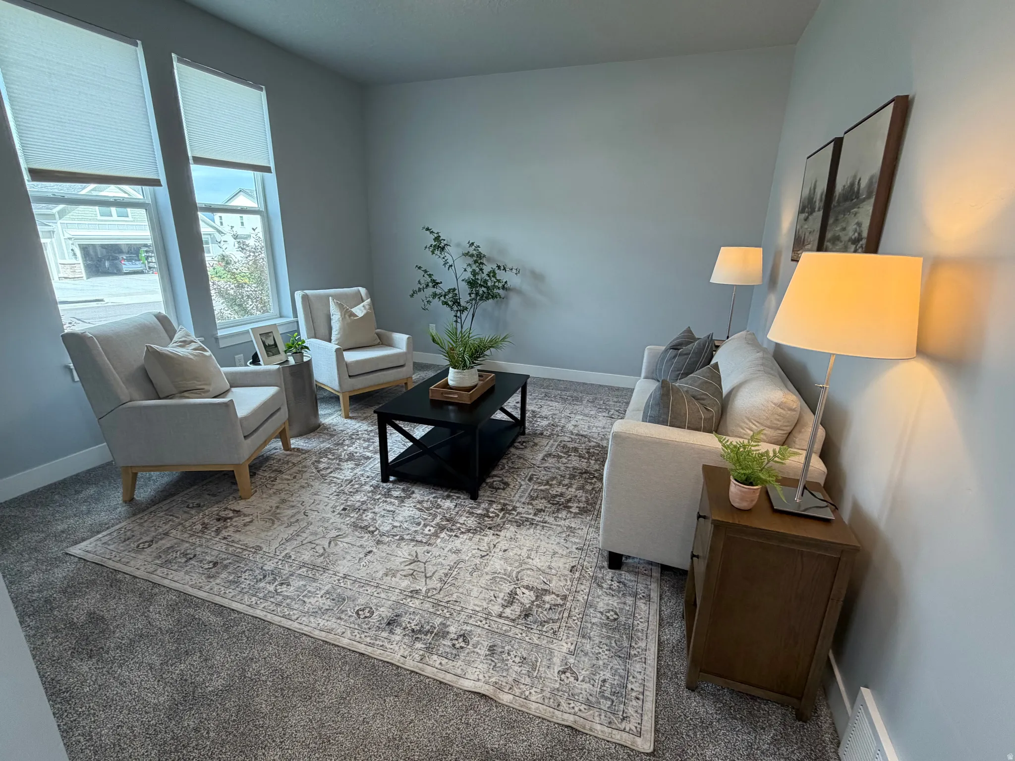 Light gray wall finishes and carpeting