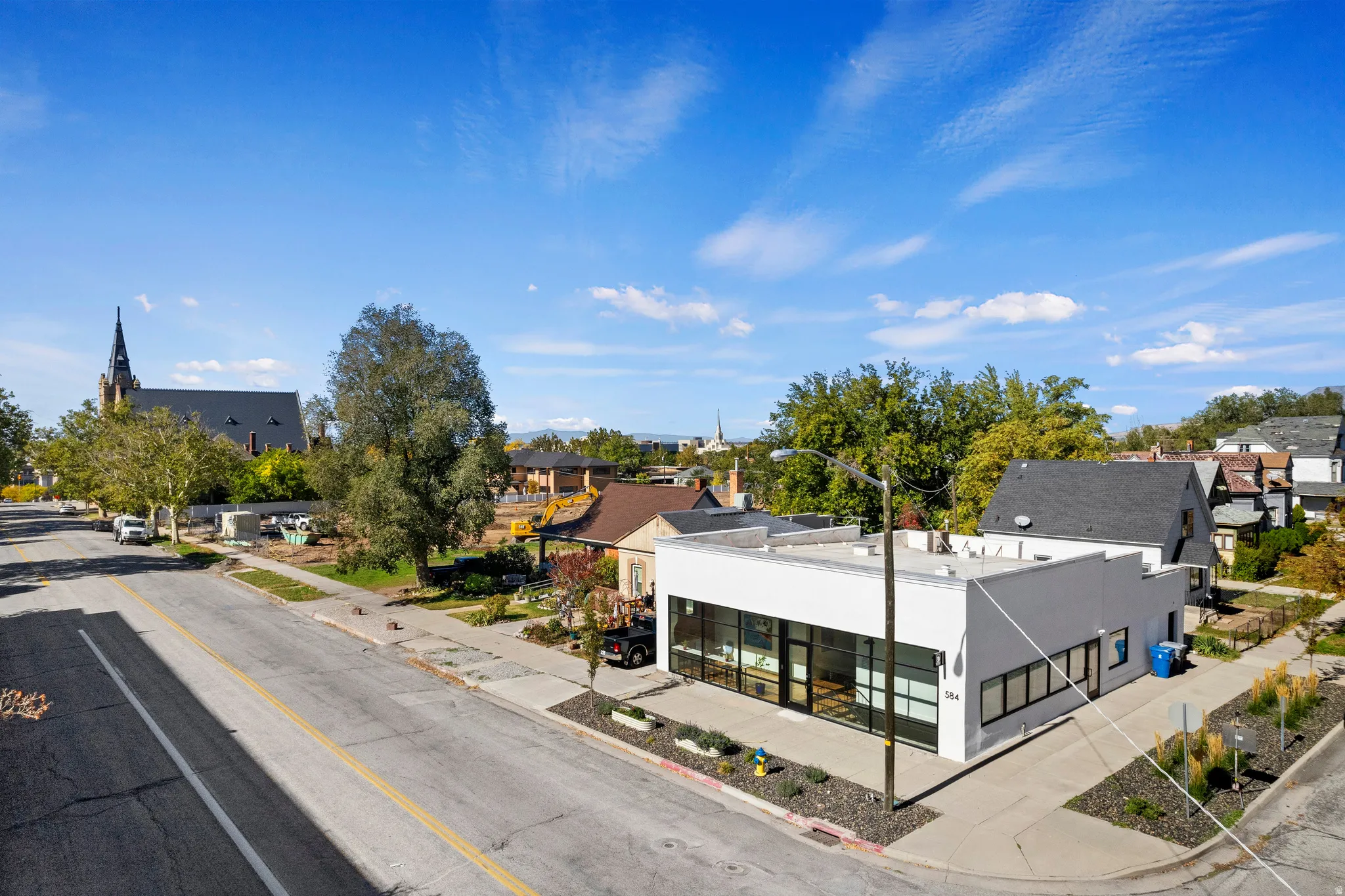 Contemporary commercial building featuring a flat roof and prominent street frontage