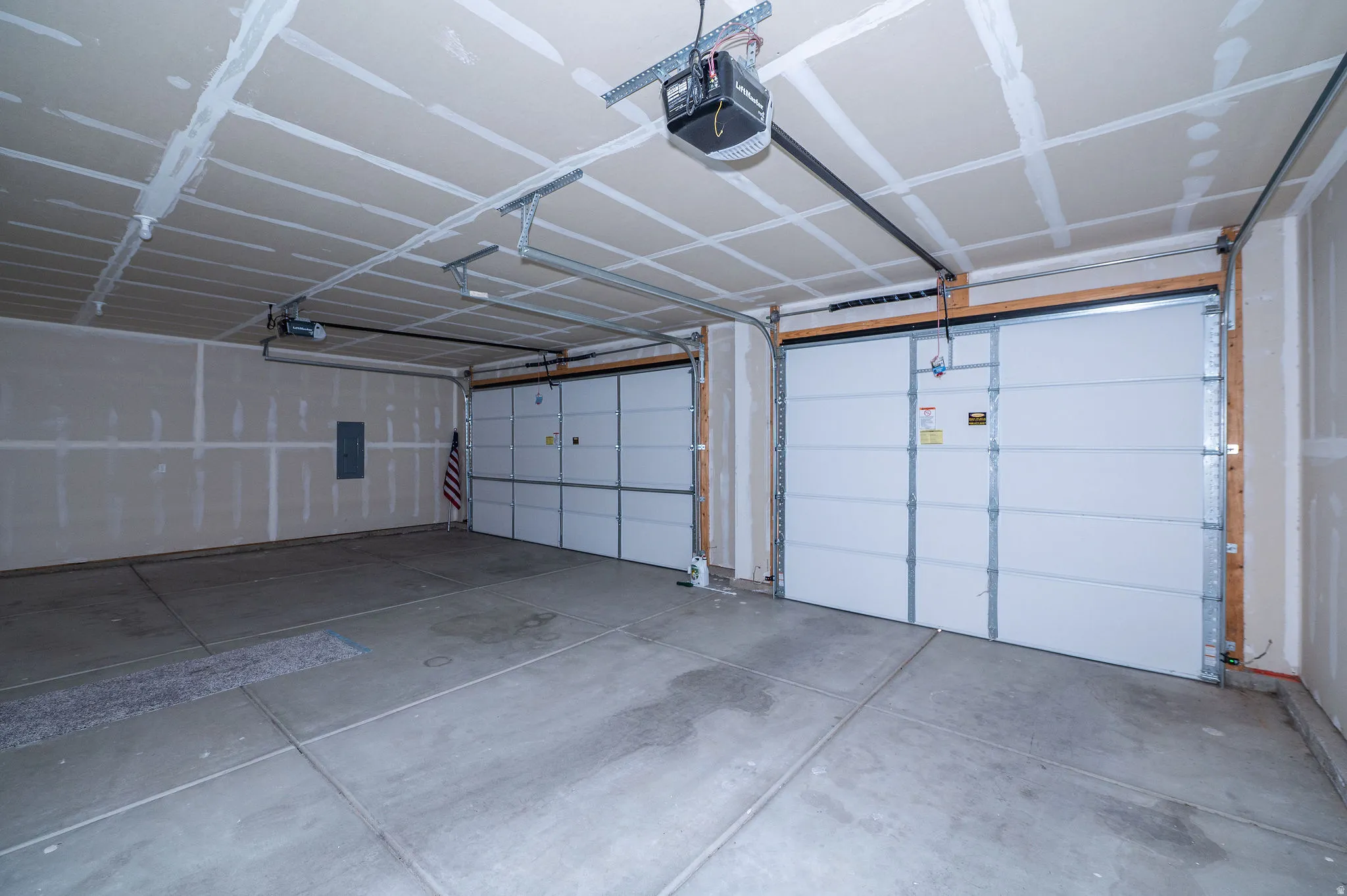 Two garage doors with automatic openers