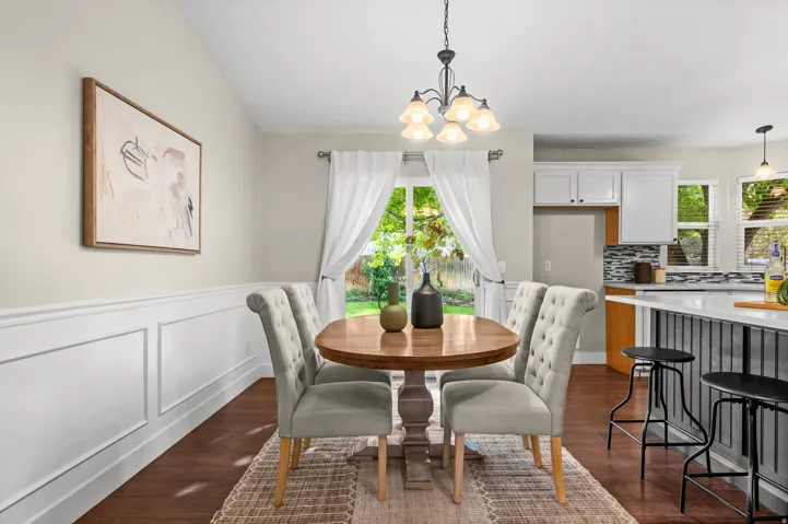 Wood-finish flooring with wainscoting detail