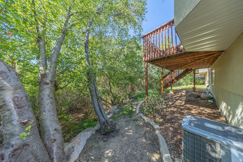 Multi-level wood deck with matching wood railings and stairs