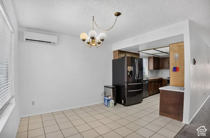 Tile flooring throughout, with a built-in air conditioning unit