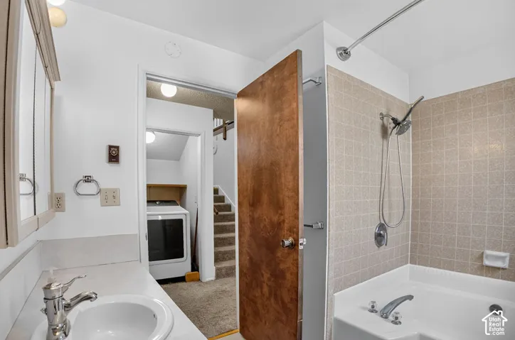 White vanity with an integrated sink and chrome faucet