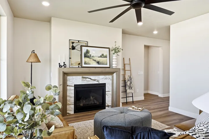 Central fireplace with stone surround and wood mantel