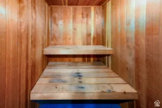 Wood-paneled interior with built-in tiered seating