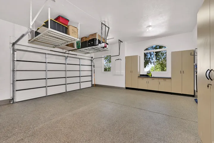 2 car side of a spacious 3 car garage