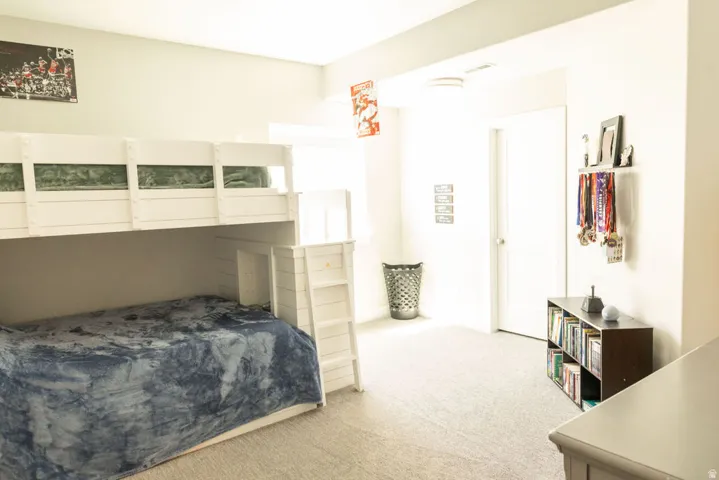 Built-in bunk beds with integrated ladder and white finish