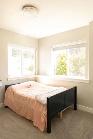 Recessed lighting fixture, light gray wall paint, and white trim