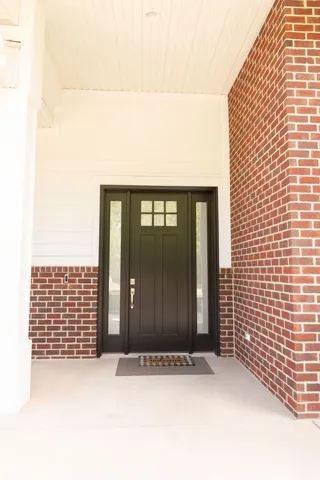 Red brick and white siding exterior