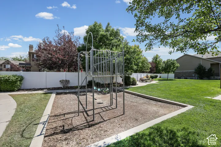 Community Grassy area with Playground and picnic tables