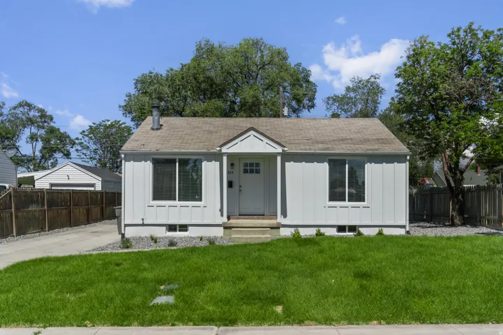 White exterior siding with contrasting trim