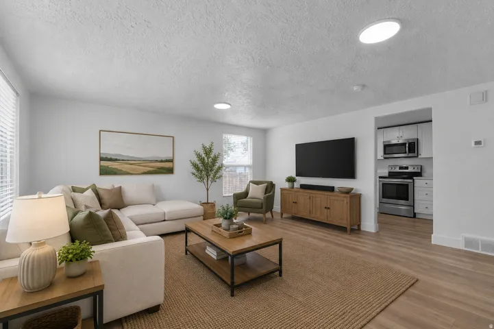 Virtually staged. Recessed lighting with textured ceiling