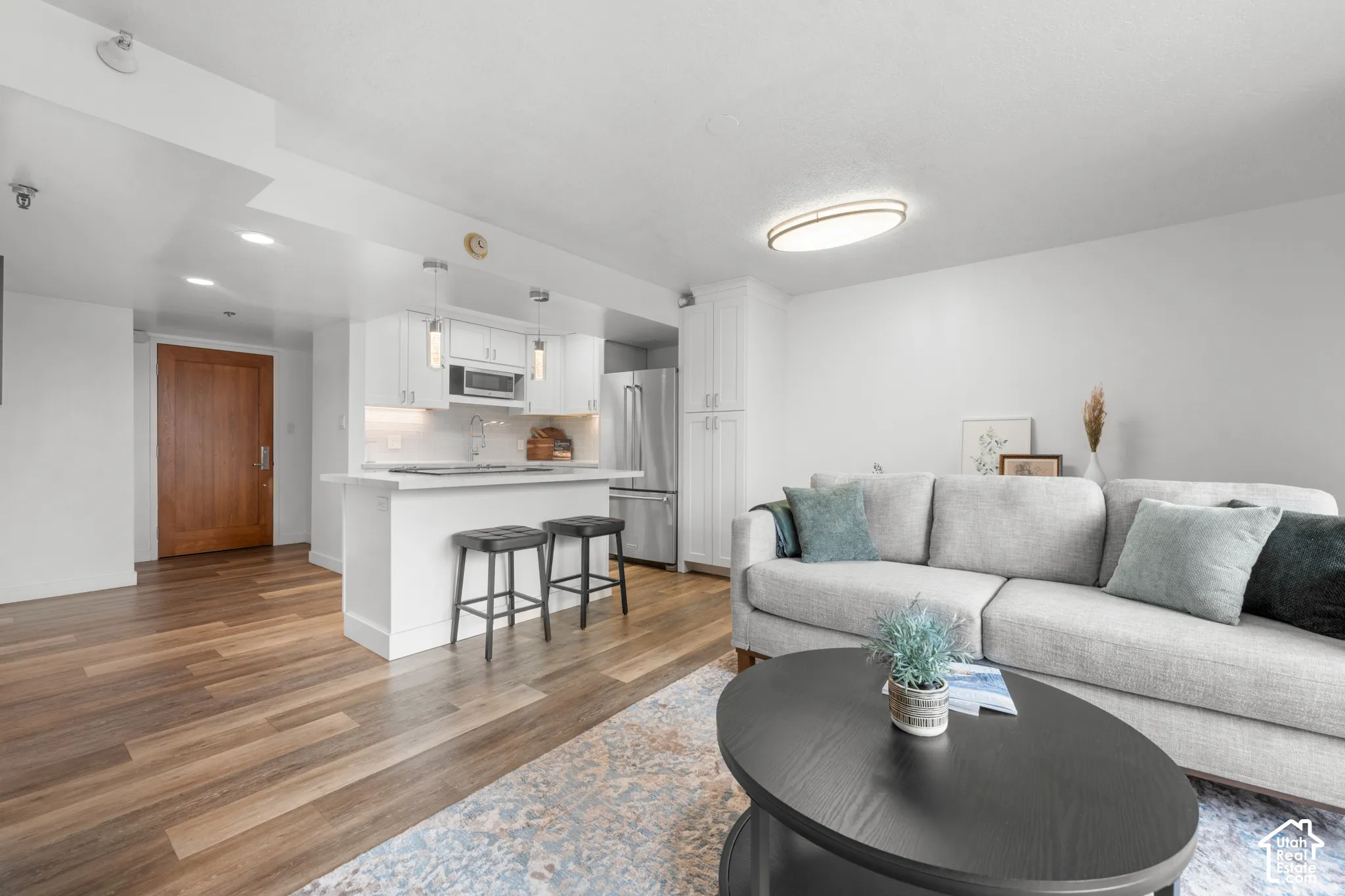Wood-finish flooring with an open-concept layout
