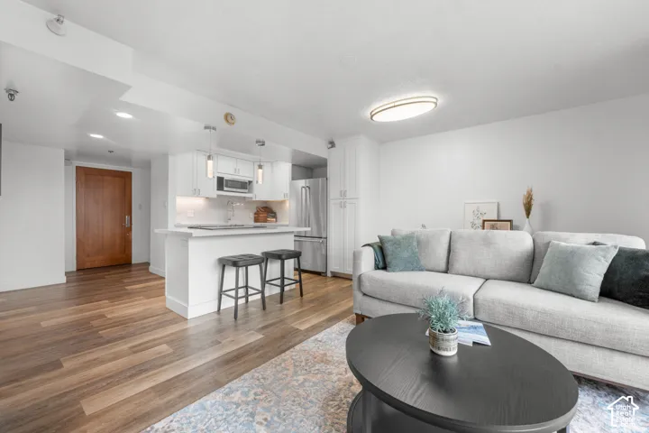 Wood-finish flooring with an open-concept layout